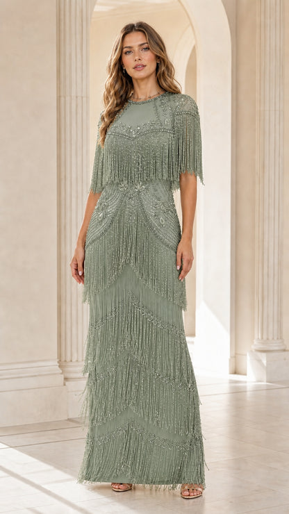 Front view of woman wearing sage green beaded tassel maxi evening gown