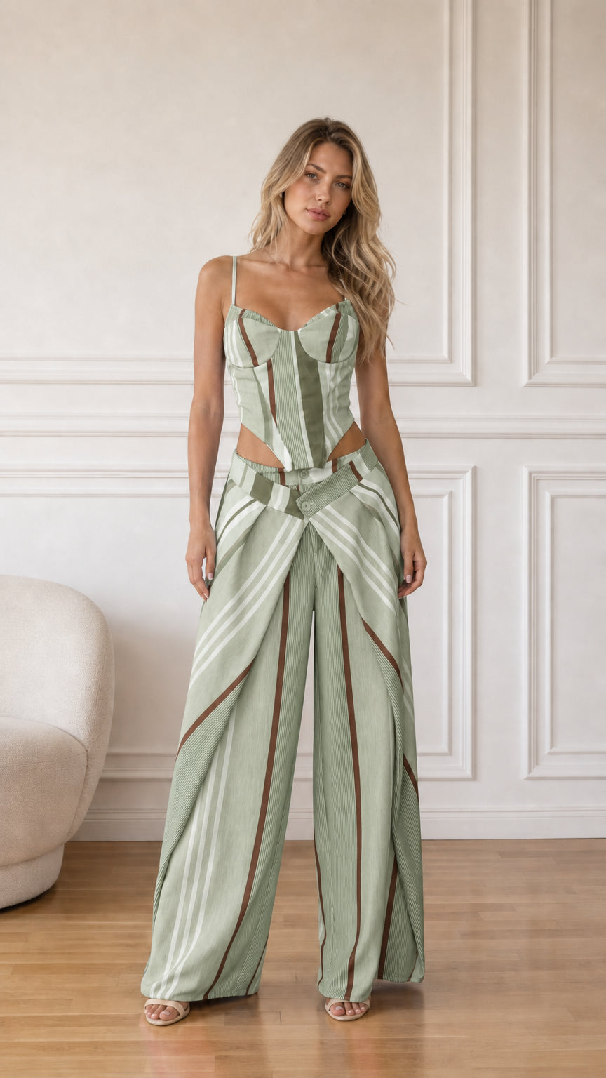 Model wearing sage multi striped corset top and wide-leg pants