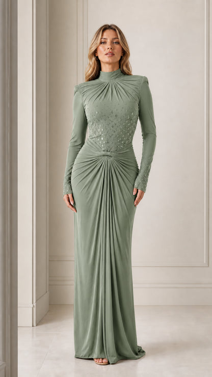 Model wearing the long-sleeve mock neck draped maxi evening gown in sage green