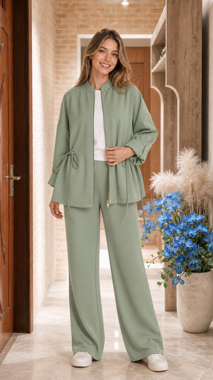 Model wearing Sage Green two-piece zip jacket and wide-leg pant set