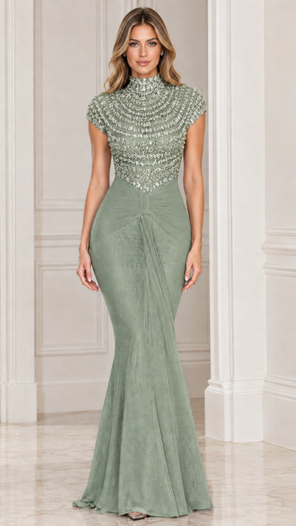 Front view of sage green beaded mock neck mermaid evening gown
