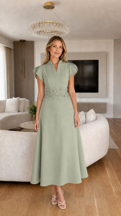 Front view of sage green flared midi dress