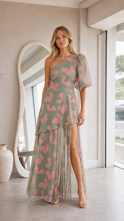 Front view of model in sage green butterfly print one-shoulder maxi dress with puff sleeve and slit