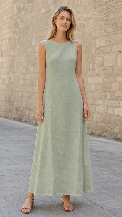 Woman wearing sage green sleeveless maxi dress