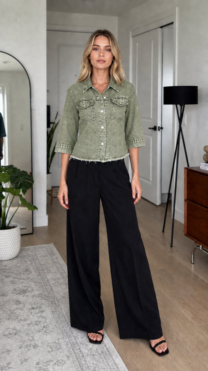 Model wearing sage green wash denim shirt jacket