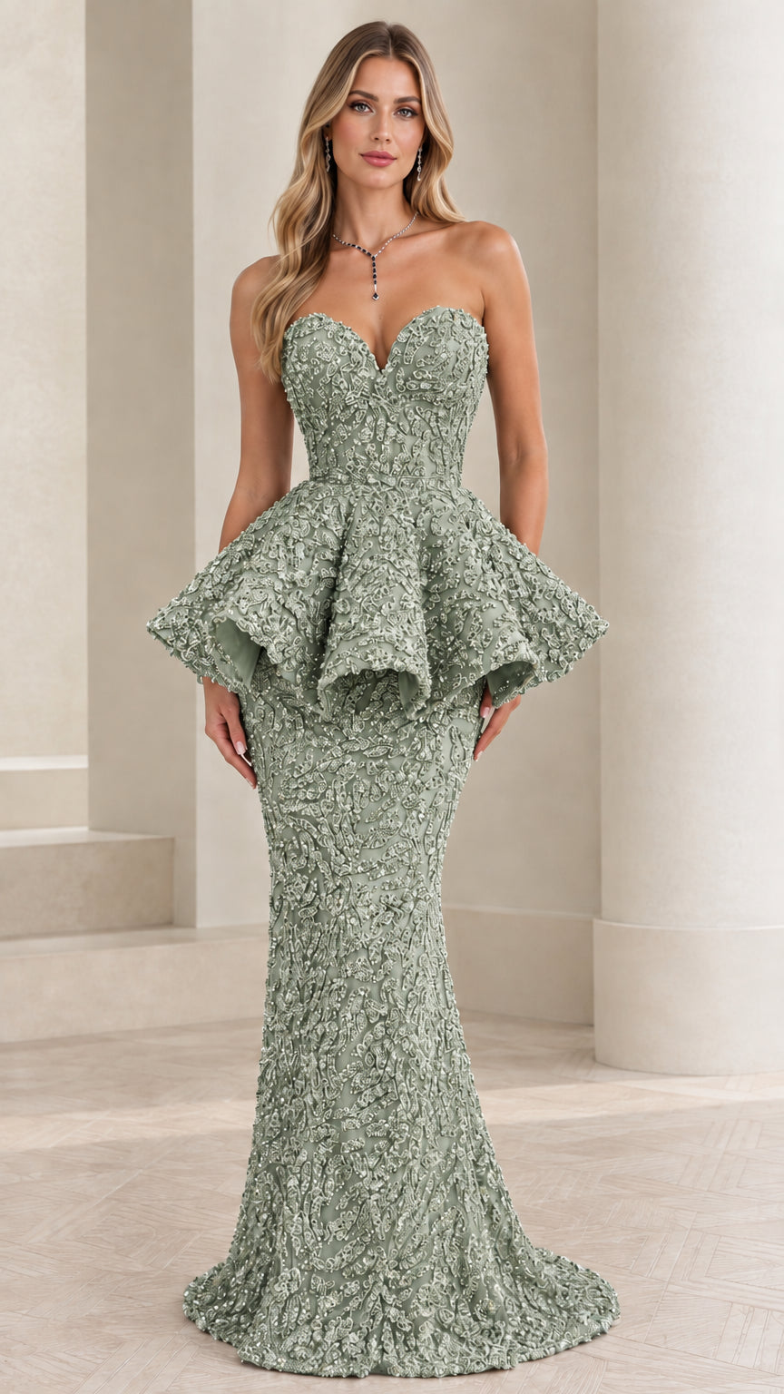 Full-length front view of the sage green strapless peplum trumpet gown