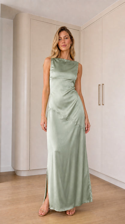 Front full-length view of model wearing sage green sleeveless satin maxi dress