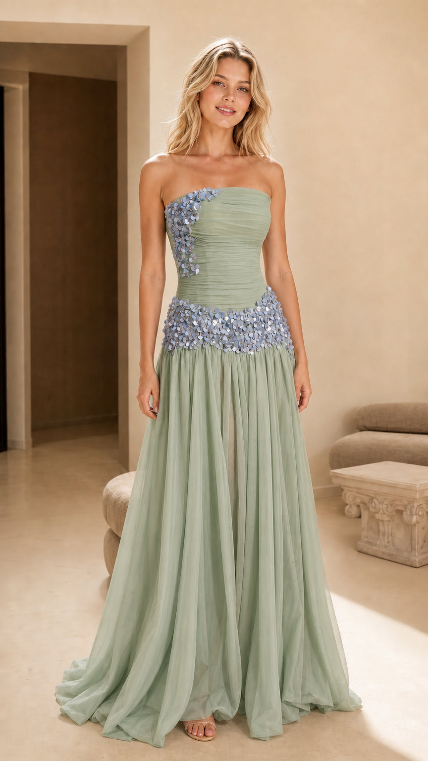 Front view of sage green strapless formal gown