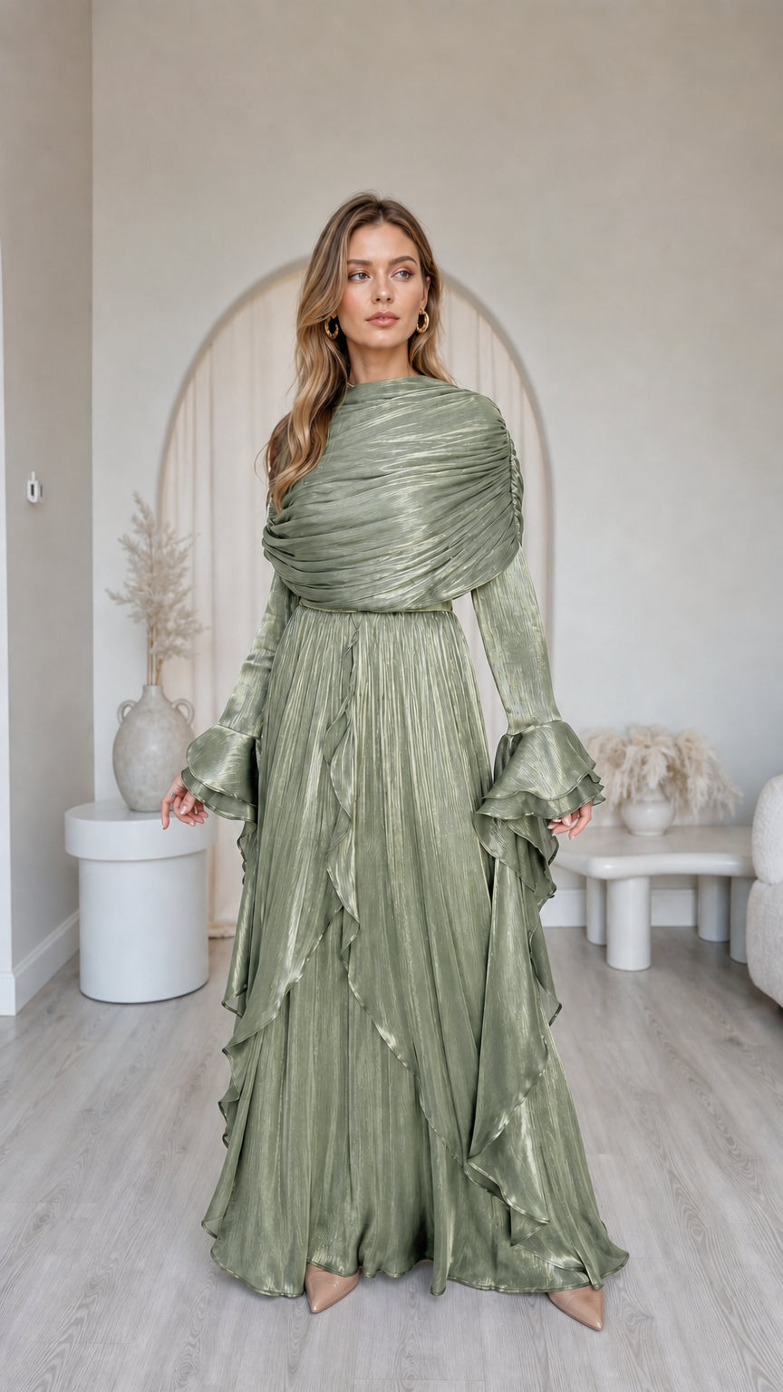Front view of model wearing metallic sage green pleated long sleeve maxi dress