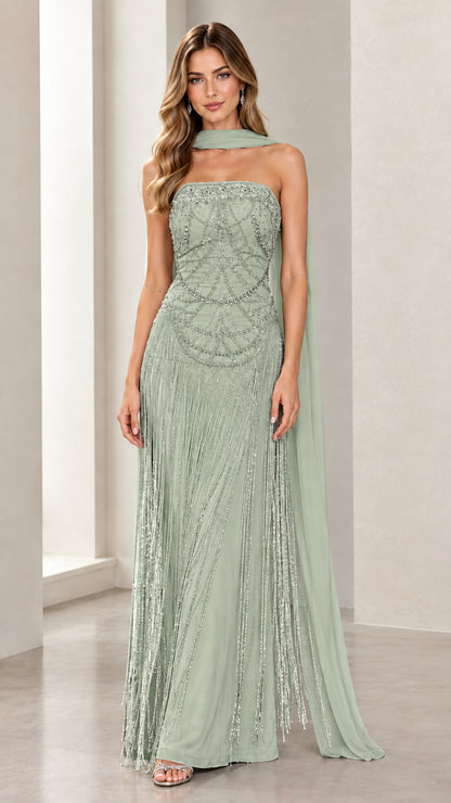 Front view of model wearing Sage Green strapless beaded fringe evening gown with green scarf cape