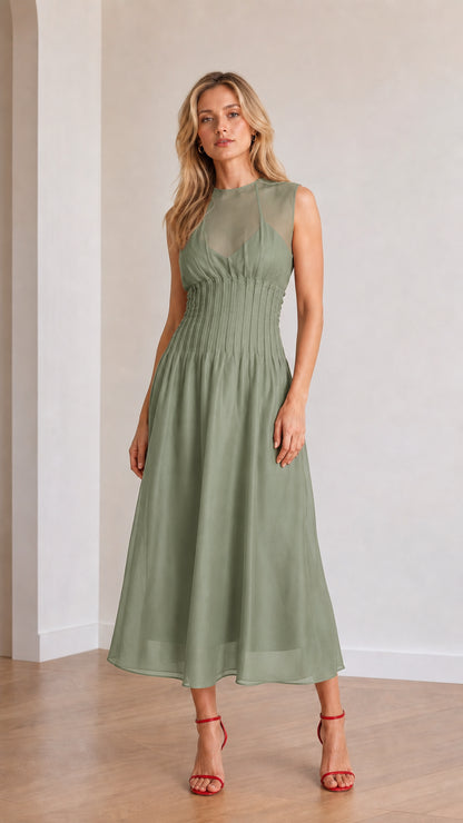 Front view of model wearing sage green sleeveless midi dress