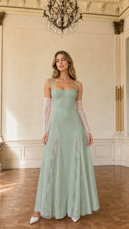 Model wearing sage green sweetheart maxi dress with lace insets