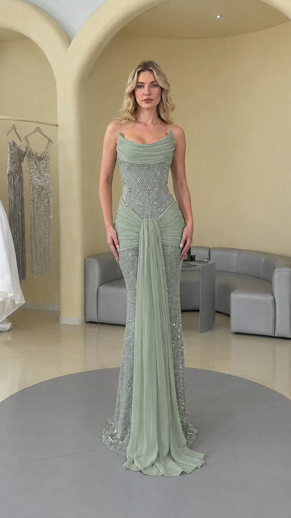 Sage green draped crystal-embellished formal evening gown