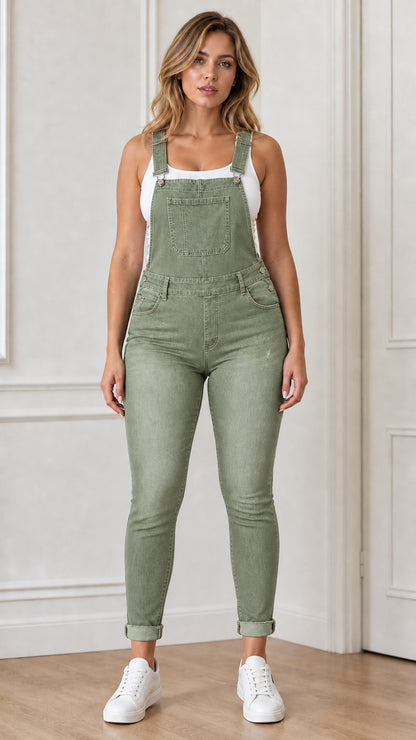 Front view of woman wearing olive green denim overalls