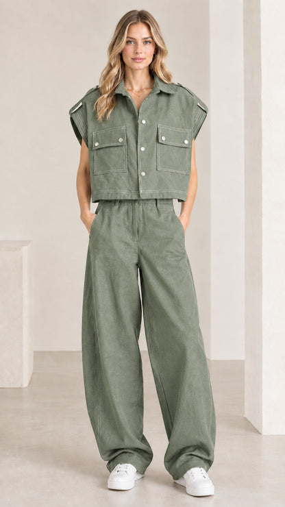 Front view of woman wearing sage green utility cropped shirt and wide-leg pant set