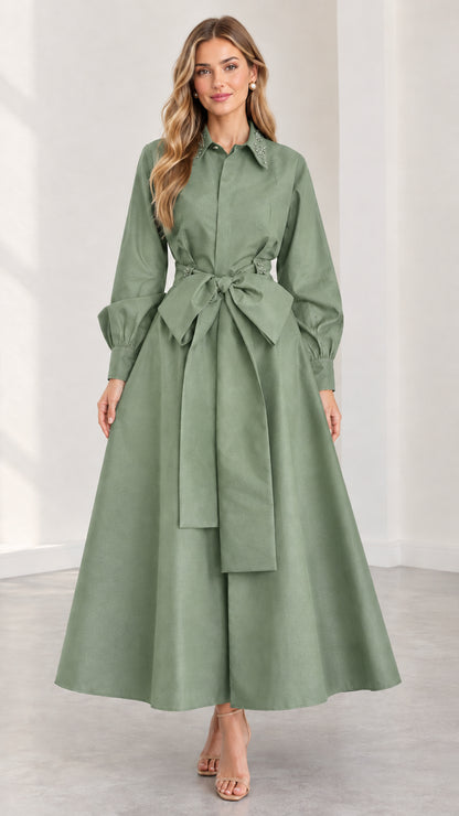 Model wearing sage green embellished collar maxi shirt dress