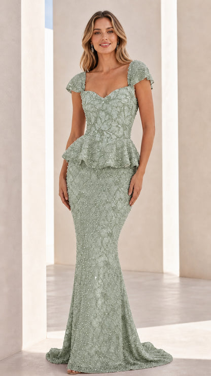 Front view of sage green embellished evening gown