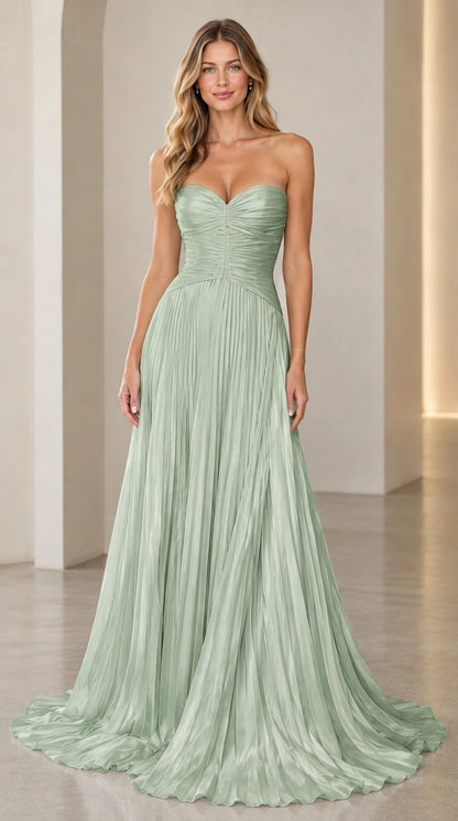 Model wearing sage green strapless sweetheart pleated maxi gown