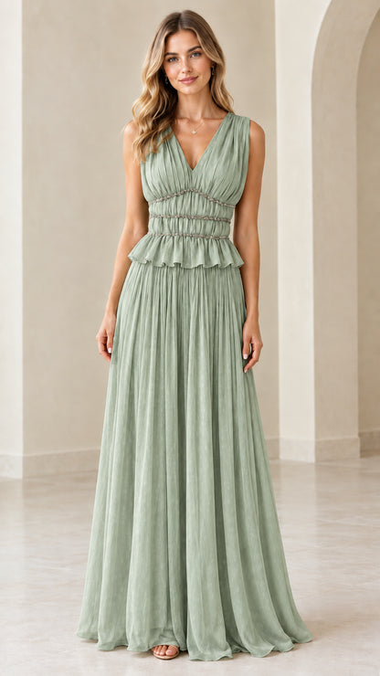 Front view of sage green sleeveless pleated maxi gown with embellished waist