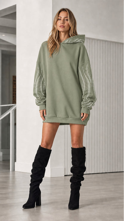 Front view of model in sage green rhinestone oversized hoodie dress