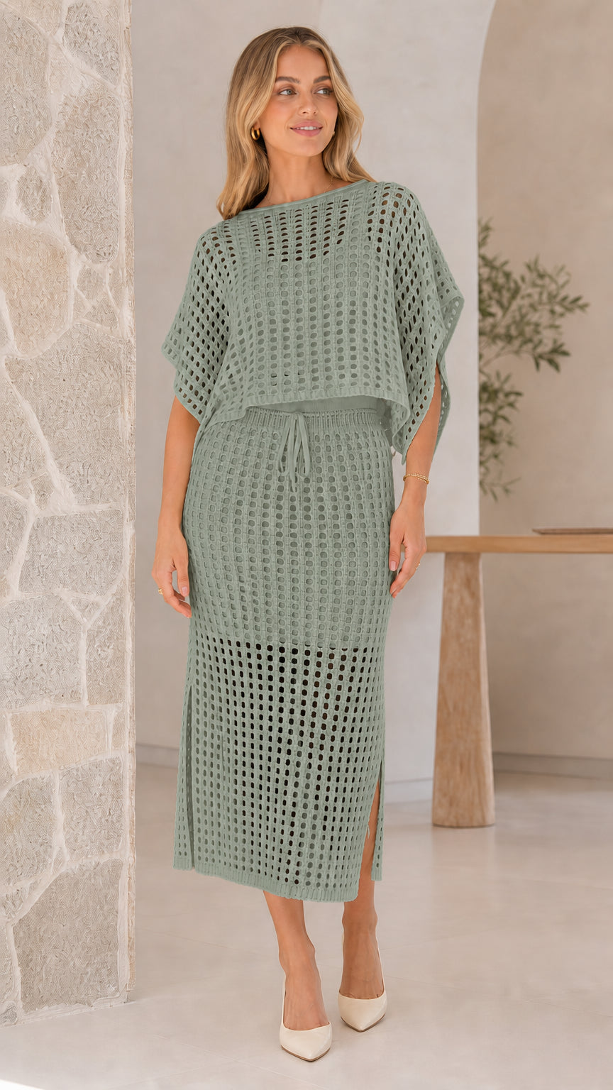 Model wearing sage green open-knit two piece skirt set