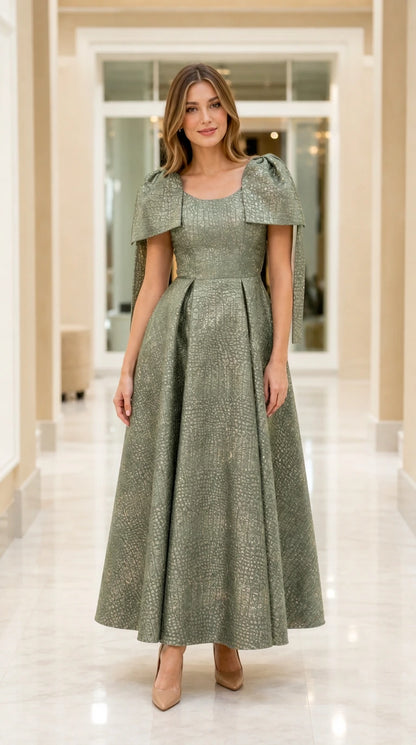 Full-length view of model wearing Sage Green capelet jacquard maxi evening dress