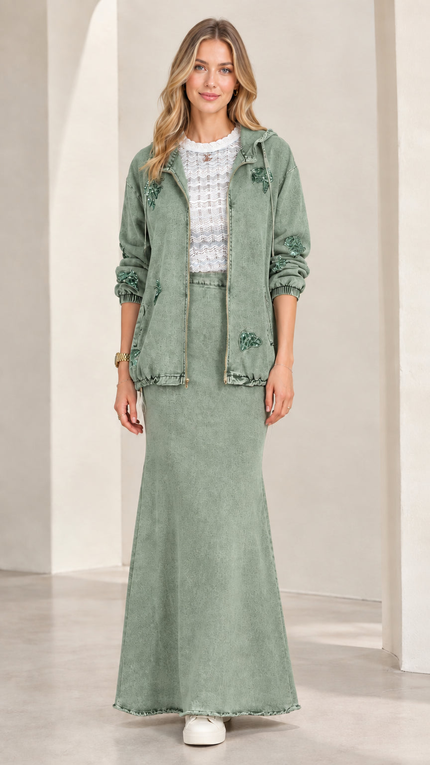 Front view of model wearing Sage Green hooded denim jacket and maxi skirt set