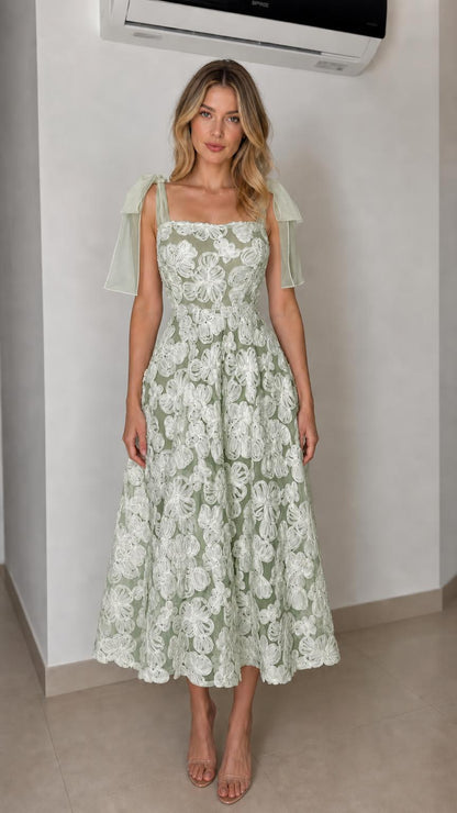 Front view of sage green floral applique midi dress