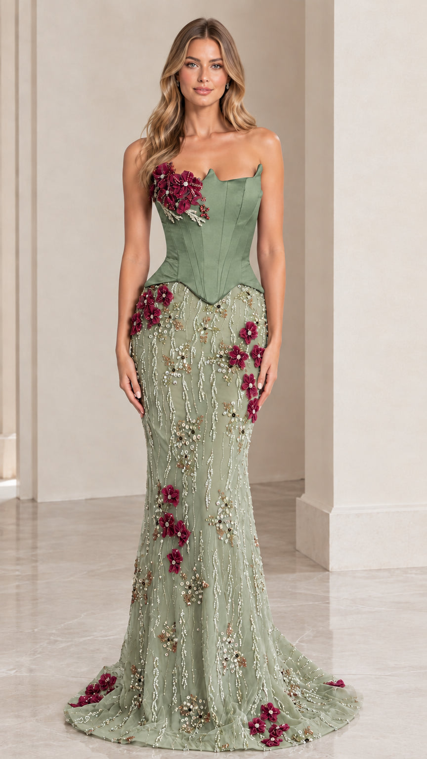 Woman wearing sage green strapless corset mermaid evening gown with floral beadwork