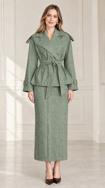 Front full-length view of women's sage green belted jacket and long skirt matching set