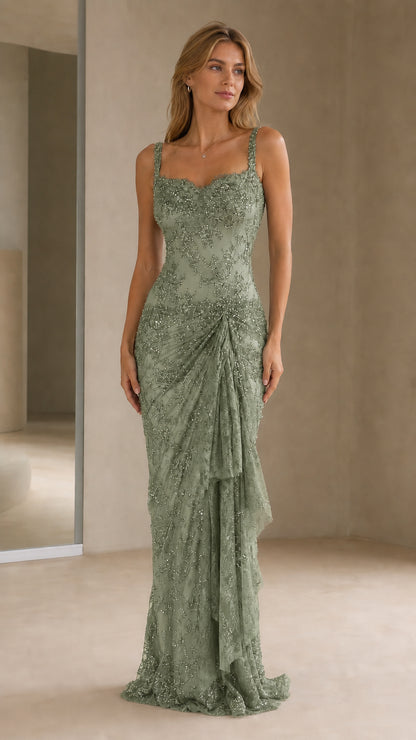 Front view of model wearing sage green beaded evening gown