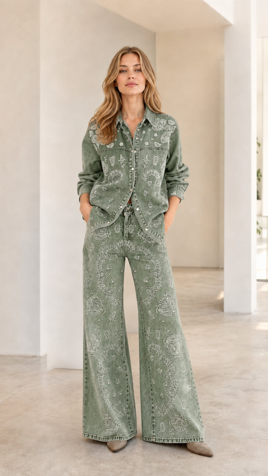 Full front view of woman wearing Sage Green paisley print denim shirt and wide-leg pants