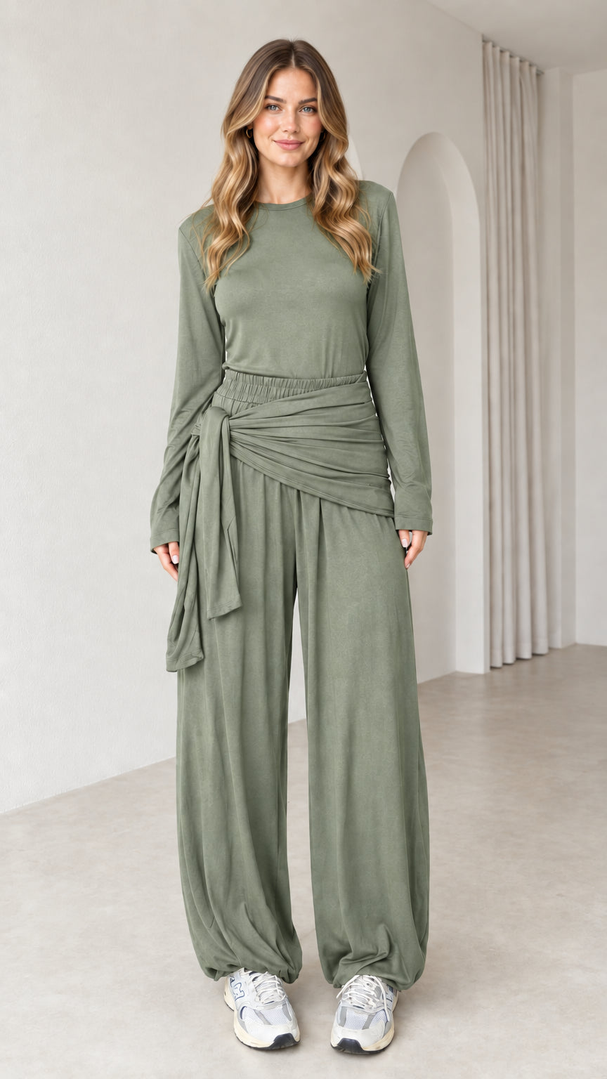 Front view of woman wearing sage green 2-piece long sleeve draped tie lounge set