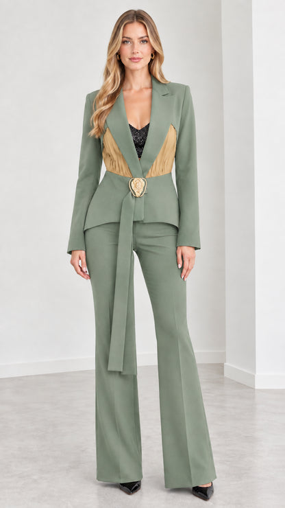 Model wearing sage green contrast pleated blazer and flare trousers set