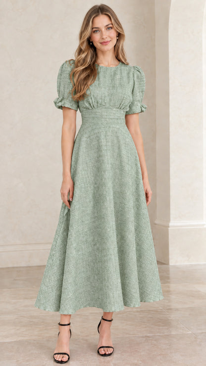 Model wearing sage green textured tweed puff sleeve midi dress