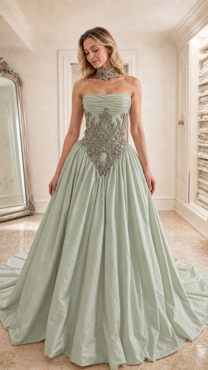 Front view of sage green strapless corset ball gown