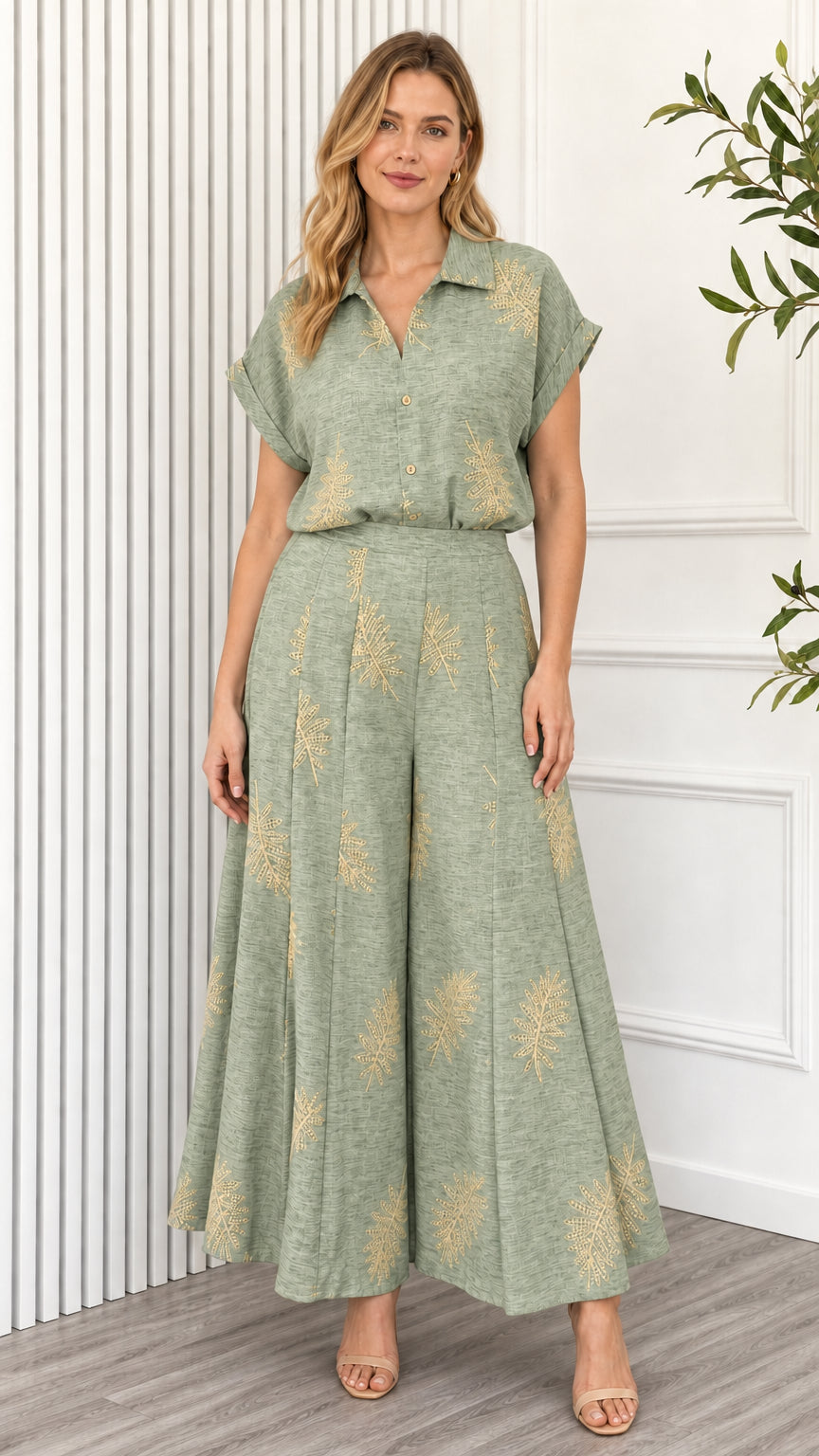 Model wearing green leaf print two piece set