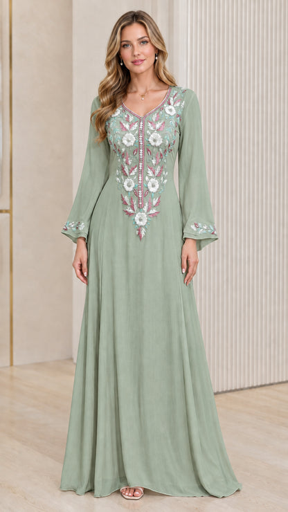 Front view of woman wearing Sage Green embroidered A-line maxi kaftan dress