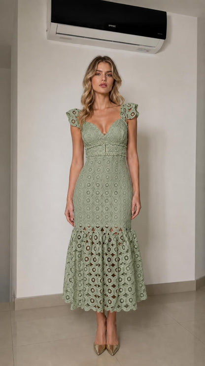 Front view of woman wearing sage green lace mermaid midi dress