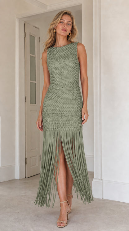 Front view of model wearing sage green woven fringe maxi dress