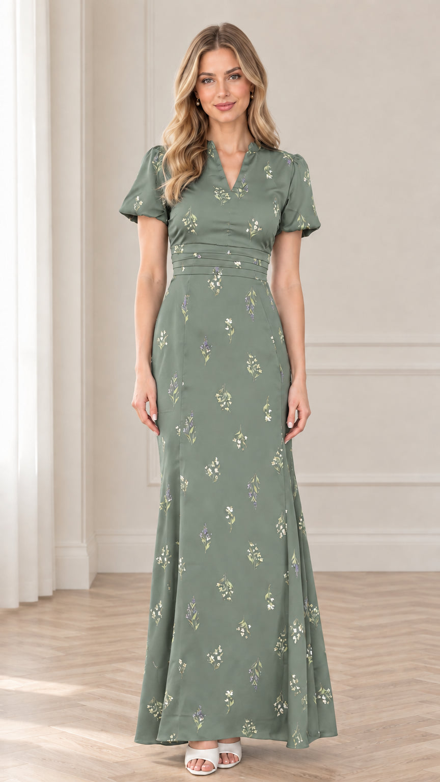 Front view of model wearing sage green floral print maxi dress