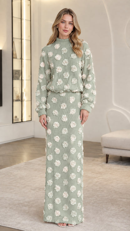 Front full-length view of woman wearing Sage Green 3D floral appliqué long sleeve top and skirt set