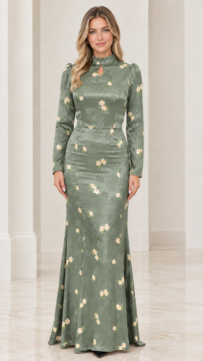 Front view of sage green floral jacquard long sleeve mermaid gown