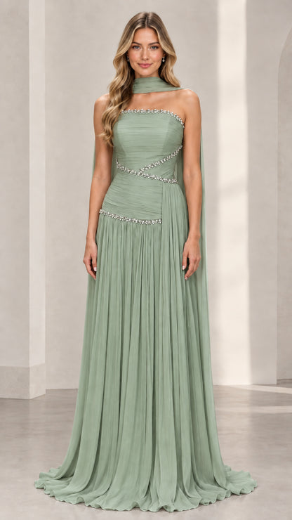 Sage green strapless formal gown with crystal trim and trailing neck scarf