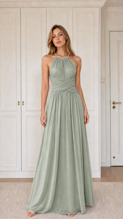 Front view of woman wearing sage green halter pleated chiffon maxi dress