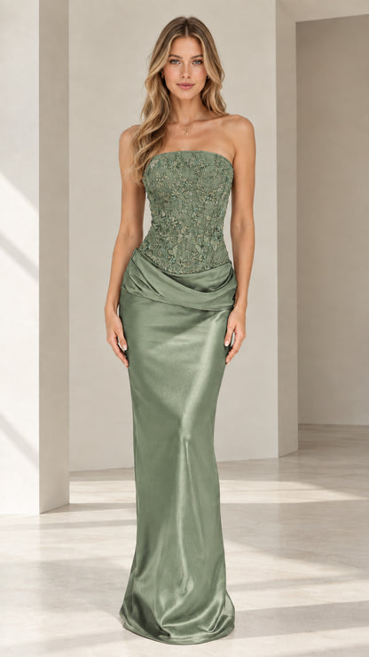 Model wearing sage green strapless beaded corset satin evening gown