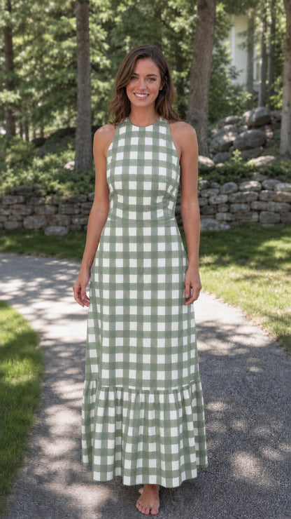 Front view of woman wearing green gingham maxi dress