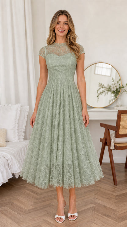 Front view of woman wearing Sage Green lace A-line midi dress