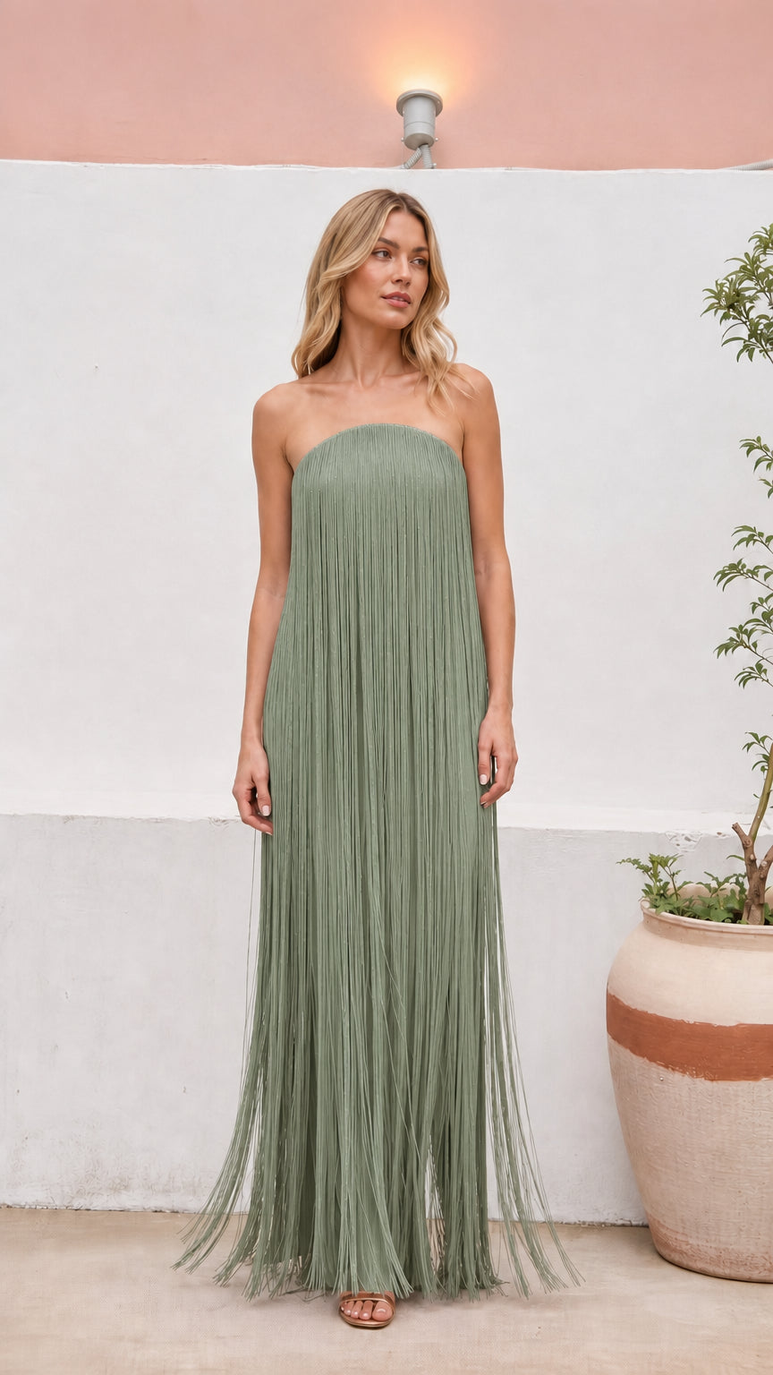 Front view of strapless tassel column maxi dress in sage green