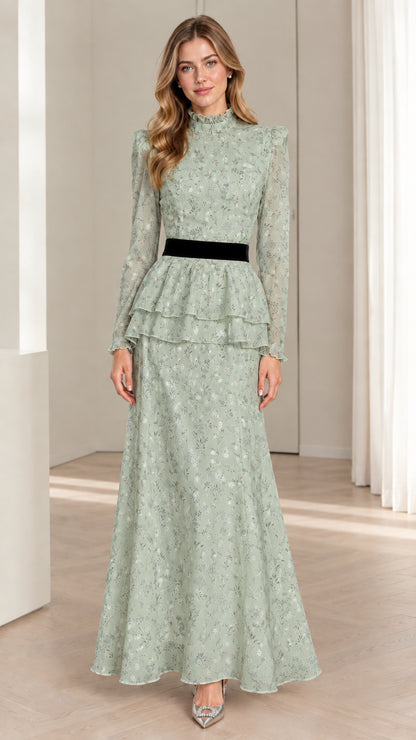 Model wearing sage green floral tiered peplum long sleeve maxi dress